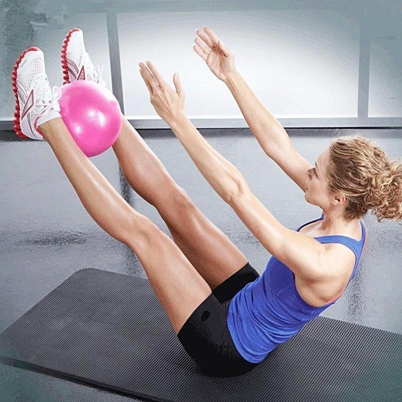 iYoganic Yoga Ball, Lady practising Yoga with a 25cm PVC Ball